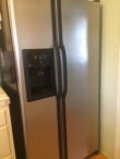 Selling GE  Stainless Steel  side by side refrigerator with water